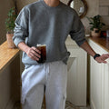 Round neck a solid knit sweater