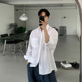 Simple white long sleeve shirt